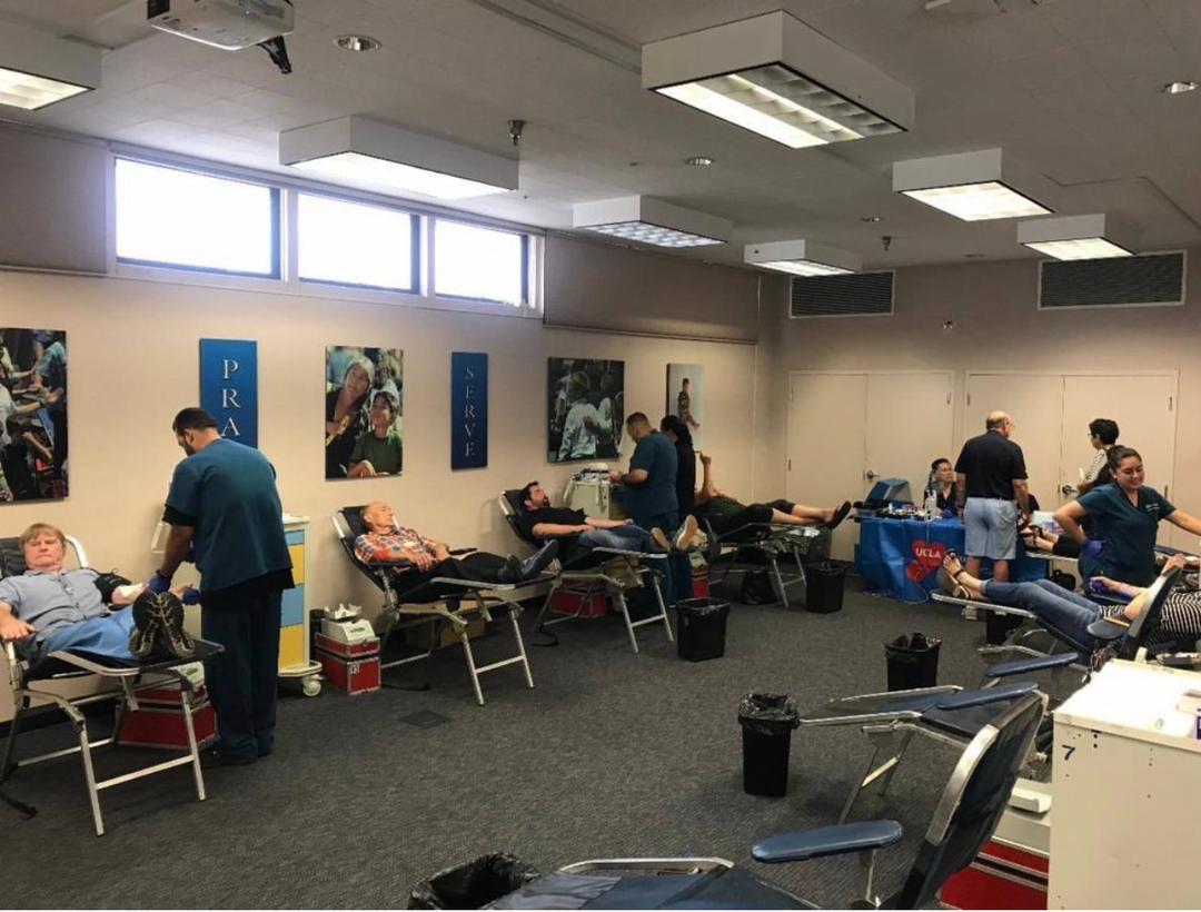 Volunteers giving blood at a community drive hosted by the church