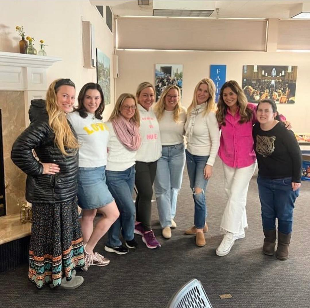 Members of the women's ministry together after a morning meeting